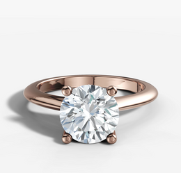 Four-Claw Tapered Solitaire Engagement Ring with Round Brilliant Cut Diamond