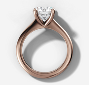 Four-Claw Tapered Solitaire Engagement Ring with Round Brilliant Cut Diamond