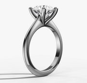 Four-Claw Tapered Solitaire Engagement Ring with Round Brilliant Cut Diamond