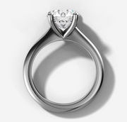 Four-Claw Tapered Solitaire Engagement Ring with Round Brilliant Cut Diamond