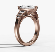 Baguette Accent Engagement Ring with Marquise Cut Diamond