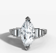 Baguette Accent Engagement Ring with Marquise Cut Diamond