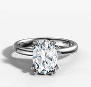 Double Claw Signature Solitaire Engagement Ring with Oval Cut Diamond