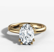 Double Claw Signature Solitaire Engagement Ring with Oval Cut Diamond