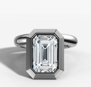 Floating Bezel Set Engagement Ring with Emerald Cut Diamond