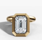 Floating Bezel Set Engagement Ring with Emerald Cut Diamond
