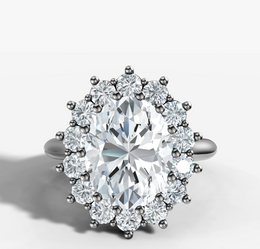 Starburt Halo Diamond Engagement Ring with Oval Cut Diamond