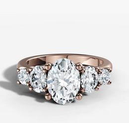 Five Stone Engagement Ring with Oval Cut Diamond