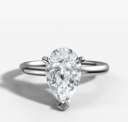 Knife Edge Solitaire Engagement Ring with Pear Cut Diamond