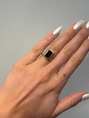 Floating Bezel Set Engagement Ring with Emerald Cut Diamond