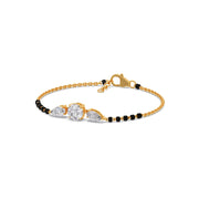 Mangalsutra Bracelet with Round and Pear Diamonds – Black Beads & Gold Chain | JewelVerra