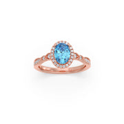 Blue Oval Gemstone Ring in Yellow Gold – Halo Diamond Design | JewelVerra