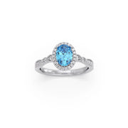 Blue Oval Gemstone Ring in Yellow Gold – Halo Diamond Design | JewelVerra