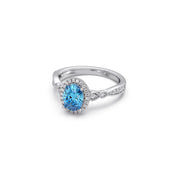 Blue Oval Gemstone Ring in Yellow Gold – Halo Diamond Design | JewelVerra