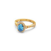 Blue Oval Gemstone Ring in Yellow Gold – Halo Diamond Design | JewelVerra
