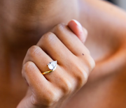 East West Curved Engagement Ring with Pear Cut Diamond